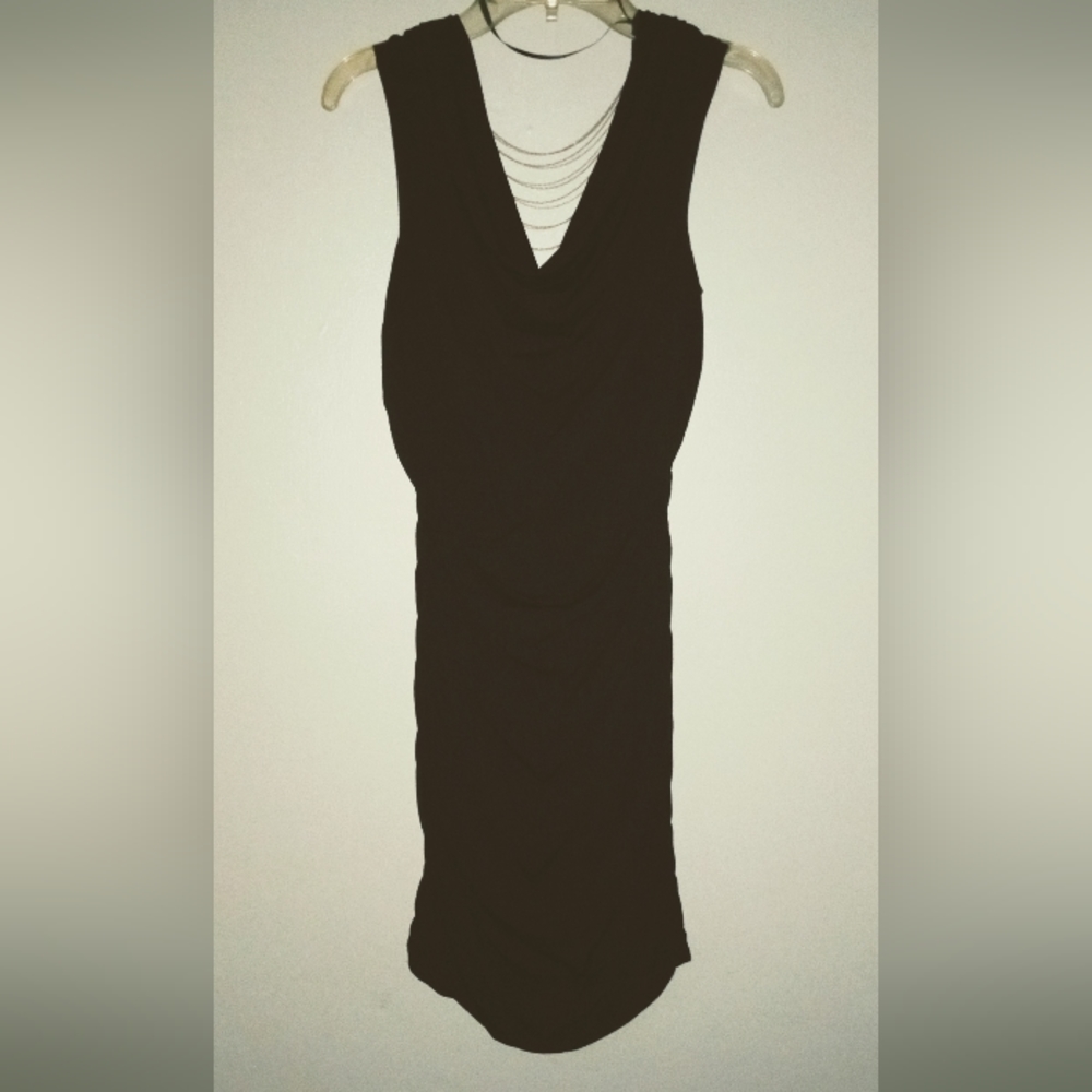 Little black dress with gold and silver beading on the back size small